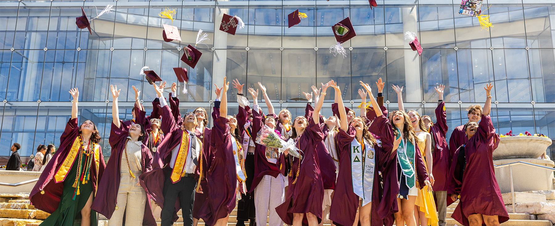 Graduates toss caps on campus 